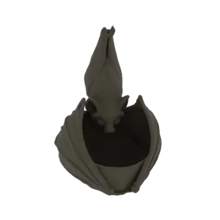 3D model of a dark gray bat hanging upside down, with its wings spread to form a planter-like opening.
