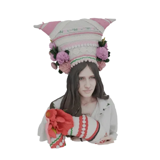 3D model of a Ukrainian woman wearing a large, colorful, flower-decorated traditional headdress and holding a patterned cylin
