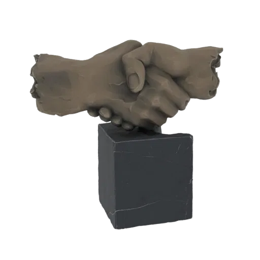 3D model of a stone-like handshake sculpture on a dark cube base, symbolizing agreement and partnership.