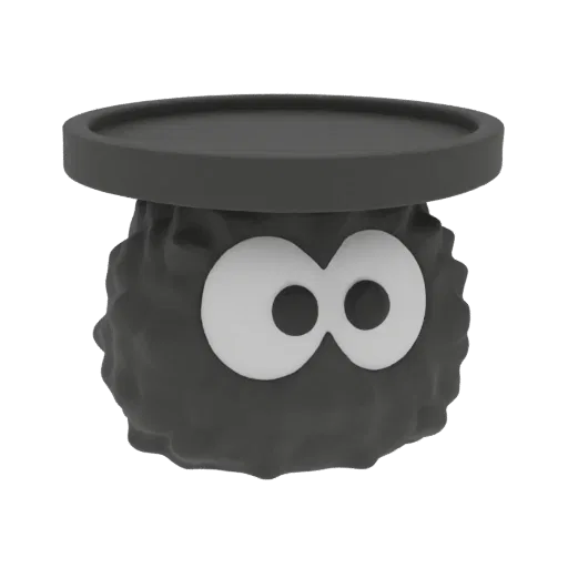 Rendu 3D d'un Esprit Suie noir avec de grands yeux blancs, tenant une plateforme circulaire noire plate.
