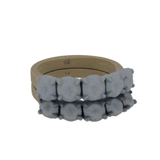 3D model of a beige beaded bracelet with a row of square-cut grey gemstones, reflecting on a dark surface.