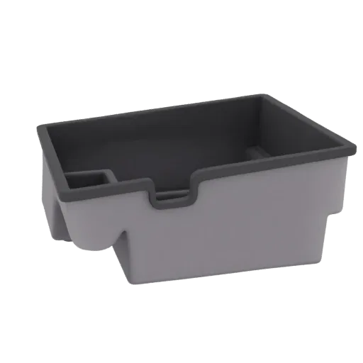 A 3D render of a modern, two-tone gray desk organizer tray with a main compartment and a smaller pen holder section.