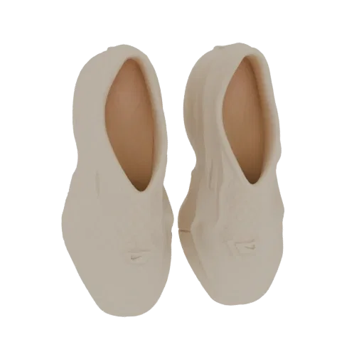 A 3D model of a pair of beige Nike ballet flats, presented from a top-down perspective against a white background.