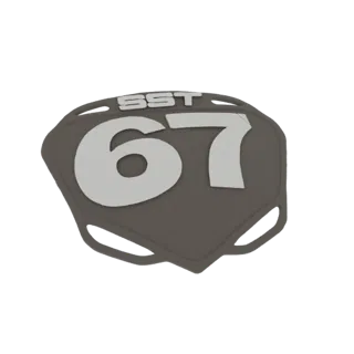 3D render of a dark grey motorcycle number plate with white 'SST' and '67' graphics, featuring mounting holes.