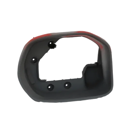 3D model render of a dark grey automotive side mirror housing with red accents on the edge.
