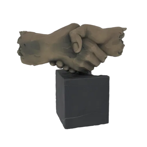 3D model of a stone-like handshake sculpture on a dark cubic base, symbolizing agreement and partnership.