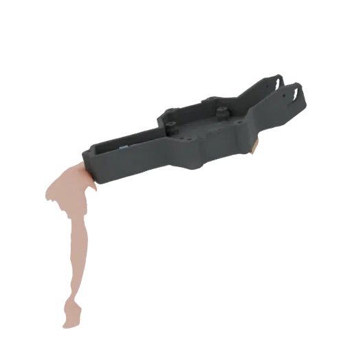 3D model of a dark gray industrial machine frame with a light-colored, flesh-toned attachment extending from one end.