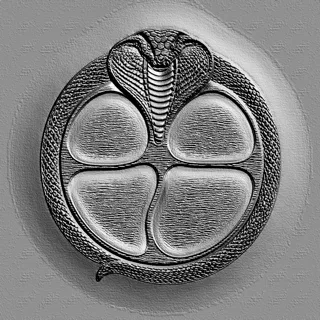 3D model of a relief featuring a cobra coiled around a four-section circle, in an engraving style.