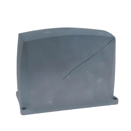 3D render of a gray rectangular enclosure with a visible crack running diagonally across its front surface, set against a whi