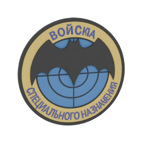 Renderização do modelo 3D do patch emblema morcego Spetsnaz Russo com texto em cirílico e silhueta de morcego sobre um globo.