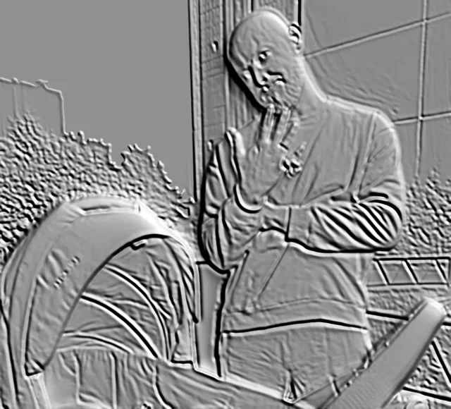 3D model of a bas-relief man in a sweater leaning against a wall, hand near face.