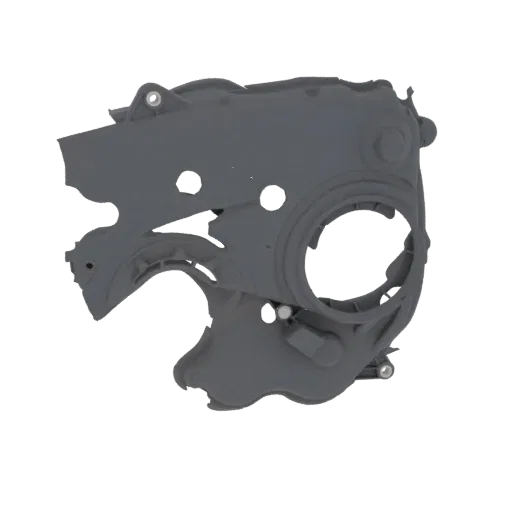 3D model of a gray automotive engine timing cover, viewed from an angle, showcasing its complex shape and internal components
