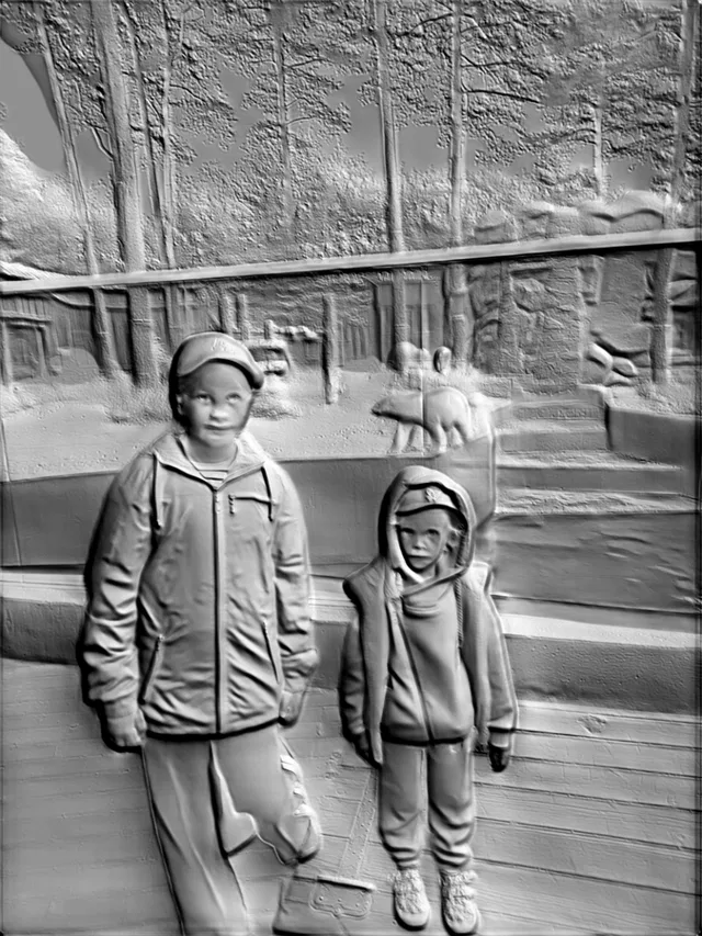 3D model of a bas-relief showing two children standing on a wooden surface against a forest background.