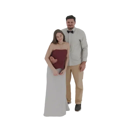 3D model of a smiling couple dressed in formal attire, the man in a shirt and bow tie, the woman in a strapless gown.