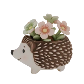 3D model of a cute hedgehog planter with pink and green flowers on its back, white background