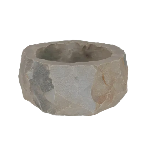3D model of a rough, faceted stone bowl with natural textures and earthy color variations.