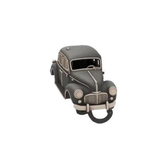 Modelo 3D de un sedán vintage gris oscuro con acentos crema y un prominente gancho de remolque frontal, sobre un fondo blanco