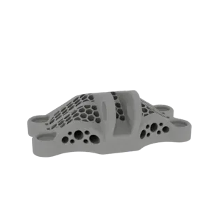 3D render of a grey industrial bracket with a honeycomb pattern on top and circular holes on the sides.