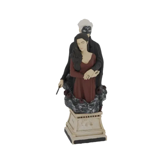 3D model of the Phantom of the Opera couple, with the masked Phantom embracing Christine in a red dress, on a rose-adorned ba