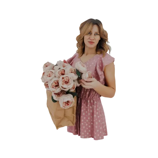 3D model of a woman in a pink floral dress holding a bouquet of pink roses in a brown paper bag.