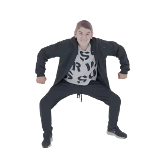 3D model of a young man in a dark tracksuit, crouching with fists clenched and a determined expression, against a white backg