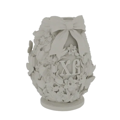 3D model of an ornate Easter egg with a decorative bow and intricate floral and butterfly reliefs, presented in a neutral mat