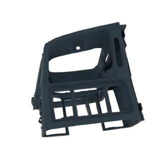 A 3D render of a dark gray automotive dashboard trim frame with visible vents and mounting brackets, isolated on a white back