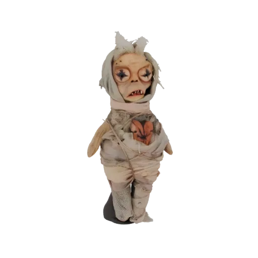 3D model of a creepy voodoo doll with tattered bandages and an exposed, stylized red heart.