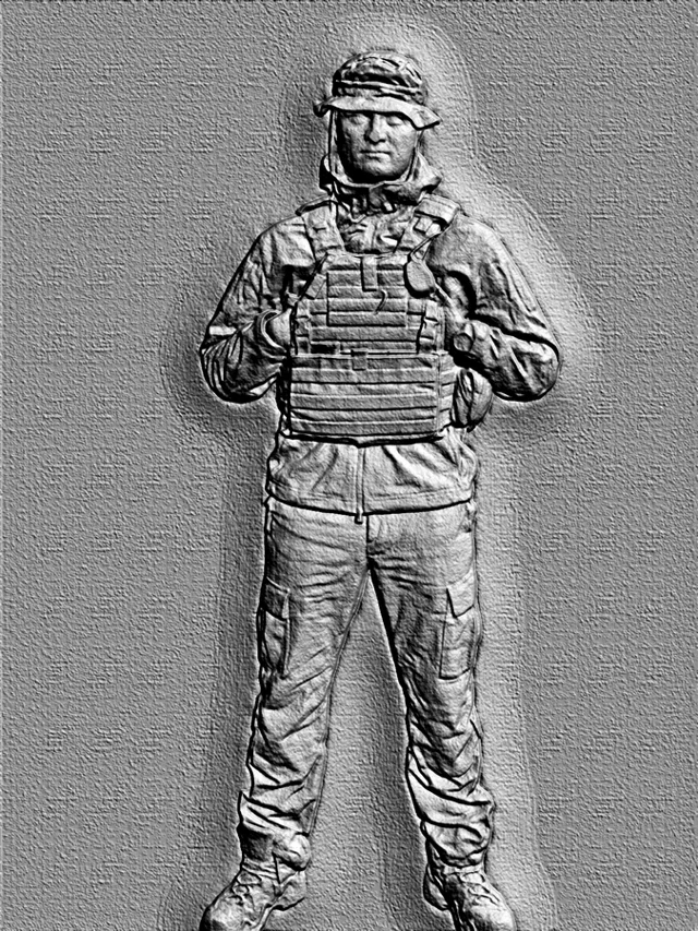 3D model of a soldier bas-relief in helmet and body armor, standing full height.