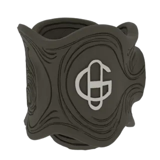 3D model of a dark, ornate cuff bracelet with a silver intertwined CG monogram and swirling decorative patterns.