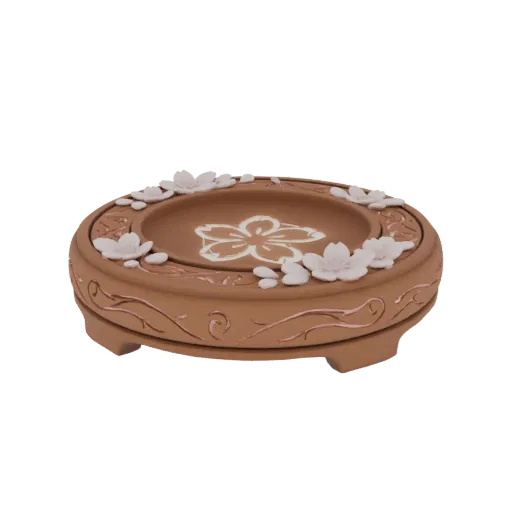3D model of a round terracotta-colored ceramic pot with raised white cherry blossoms and vine carvings.