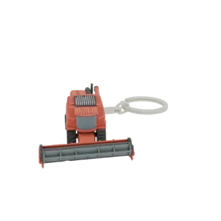 3D model of an orange combine harvester designed as a keychain charm, shown against a black background.