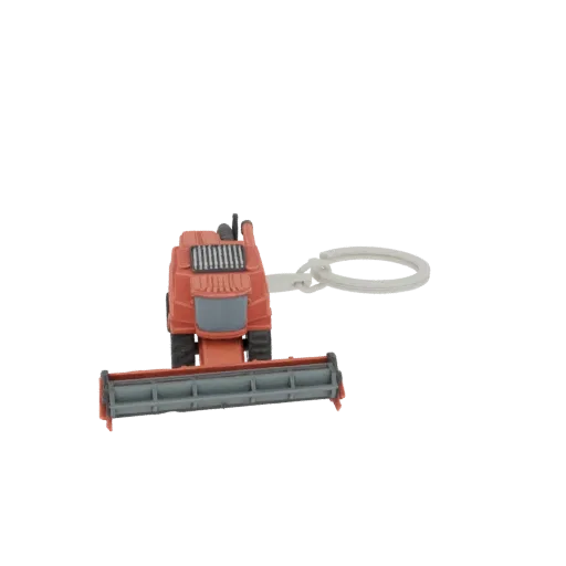 3D model of an orange combine harvester designed as a keychain charm, shown against a black background.