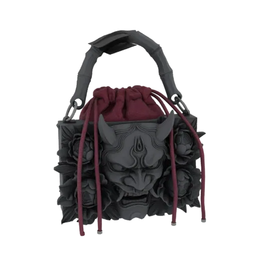 3D model of a grey handbag featuring a carved Oni mask and peony flowers, with a dark red drawstring closure and bamboo-style