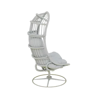Side view of a white rattan egg chair with a plush cushion and a circular swivel base, set against a black background.
