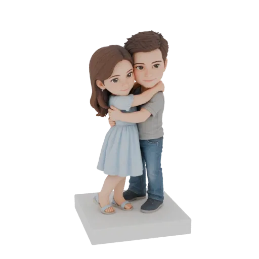 3D model of a couple embracing, the woman in a blue dress and the man in a grey shirt and jeans, standing on a white base.