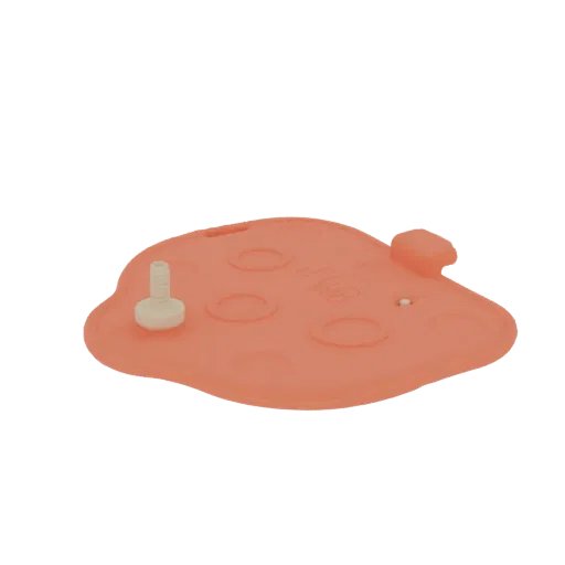 3D model of a peachy-orange mushroom-shaped silicone suction cup with circular indentations and a central stem.