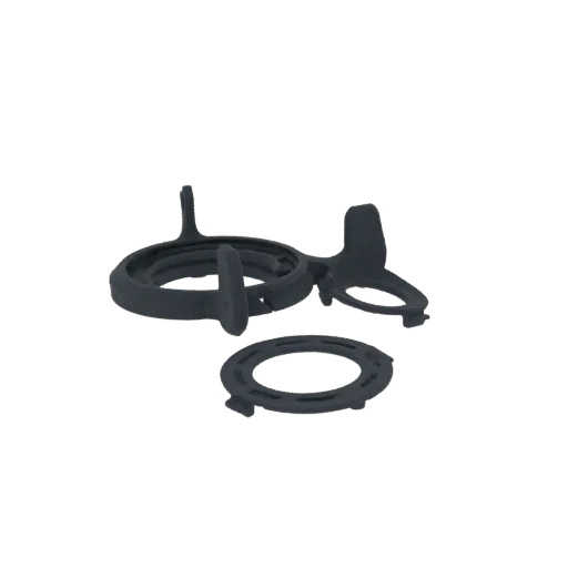 A 3D render of a dark gray modular ring holder system, including a circular ring holder, a clip, and a separate base, against
