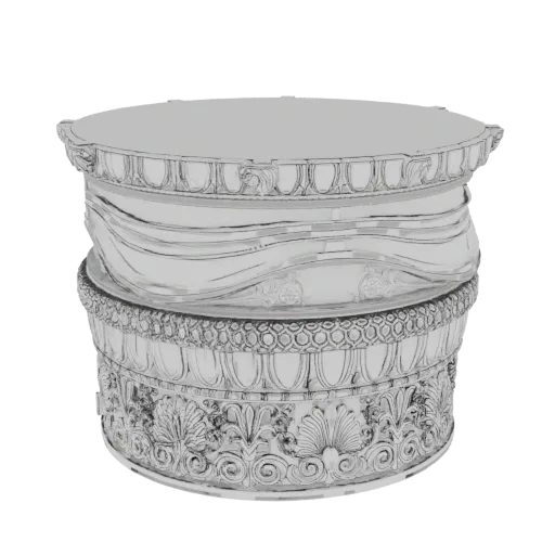 3D model of an ornate silver round box with intricate classical carvings and a polished metallic finish.