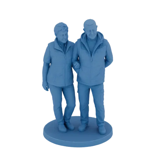 3D model of an elderly couple, a man and woman, walking arm-in-arm, standing on a circular base.