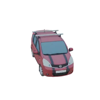 3D model of a red Nissan Note MPV with a silver roof rack, viewed from a three-quarter front angle.