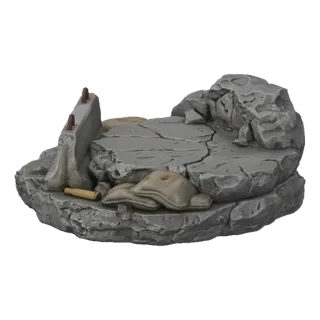 3D model of a diorama base featuring a damaged concrete barrier, sandbags, and a spent shell casing on a rocky, debris-filled