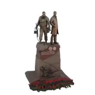 3D model of the Chernobyl Liquidators Monument, showing two figures on a rocky base with red and green lava-like elements.