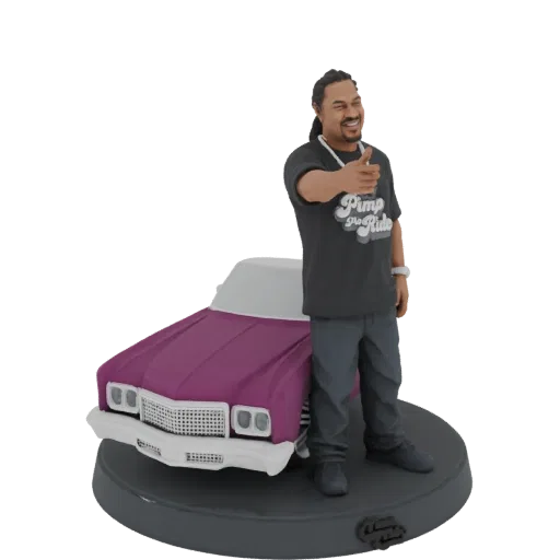 3D model of a Pimp My Ride figure in a black t-shirt, pointing and standing next to a purple classic car on a display base.