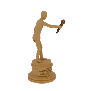 3D model of a 'Journalist of the Year' trophy featuring a stylized figure holding a microphone on a tiered base.