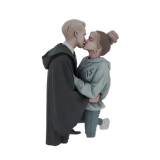 Modello 3D di una giovane coppia che si bacia, il maschio con una veste scura in stile Hogwarts e la femmina con felpa blu e