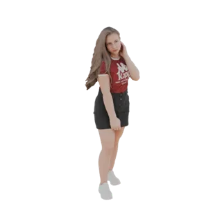3D model of a young woman with long blonde hair, wearing a red Kappa t-shirt and black denim shorts, posing casually.