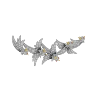 A 3D render of an Art Nouveau-style brooch shaped like a bird, with intricate feather details and small yellow and red gemsto
