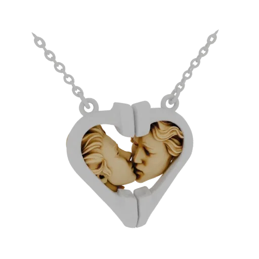 3D model of a heart-shaped pendant with two faces kissing inside, suspended on a delicate chain.