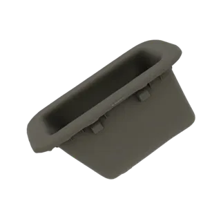 3D model of a car interior grab handle trim, a dark gray plastic piece with a recessed grip area.